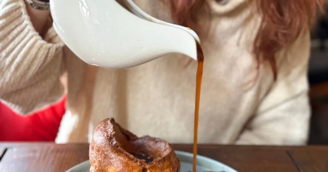 0_image-of-girl-enjoying-a-festive-christmas-roast-dinner-with-tender-beef-yorkshire-puddings-roast-potatoes-savory
