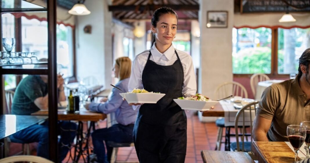 2_waitress-serving-food-at-restaurantjpgy